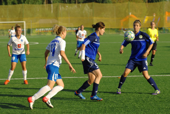 Girls playing soccer